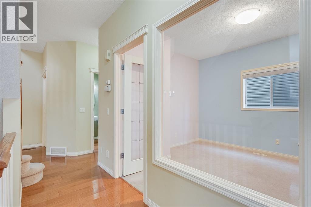 596 Cougar Ridge Drive Sw, Calgary, Alberta  T3H 5A4 - Photo 18 - A2216232