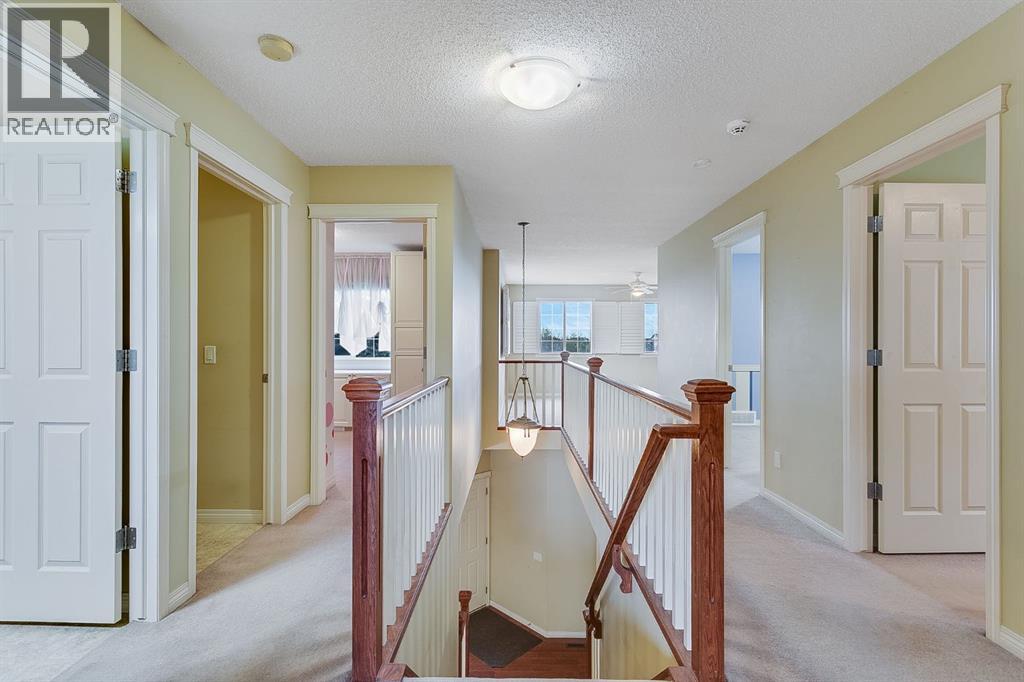 596 Cougar Ridge Drive Sw, Calgary, Alberta  T3H 5A4 - Photo 21 - A2216232