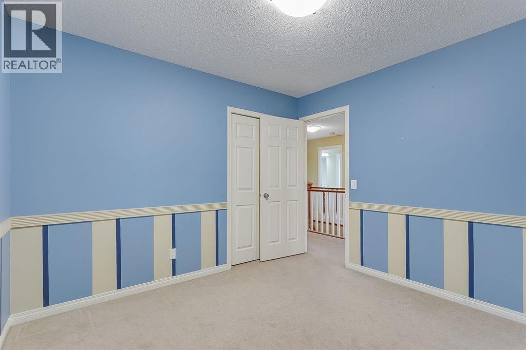 596 Cougar Ridge Drive Sw, Calgary, Alberta  T3H 5A4 - Photo 26 - A2216232