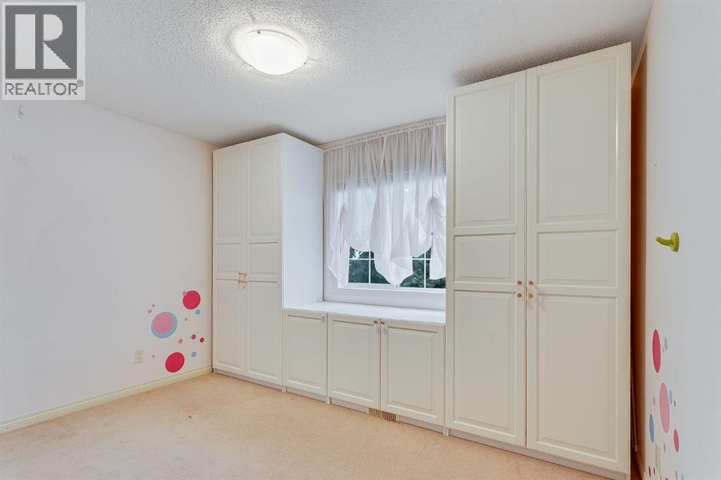 596 Cougar Ridge Drive Sw, Calgary, Alberta  T3H 5A4 - Photo 29 - A2216232