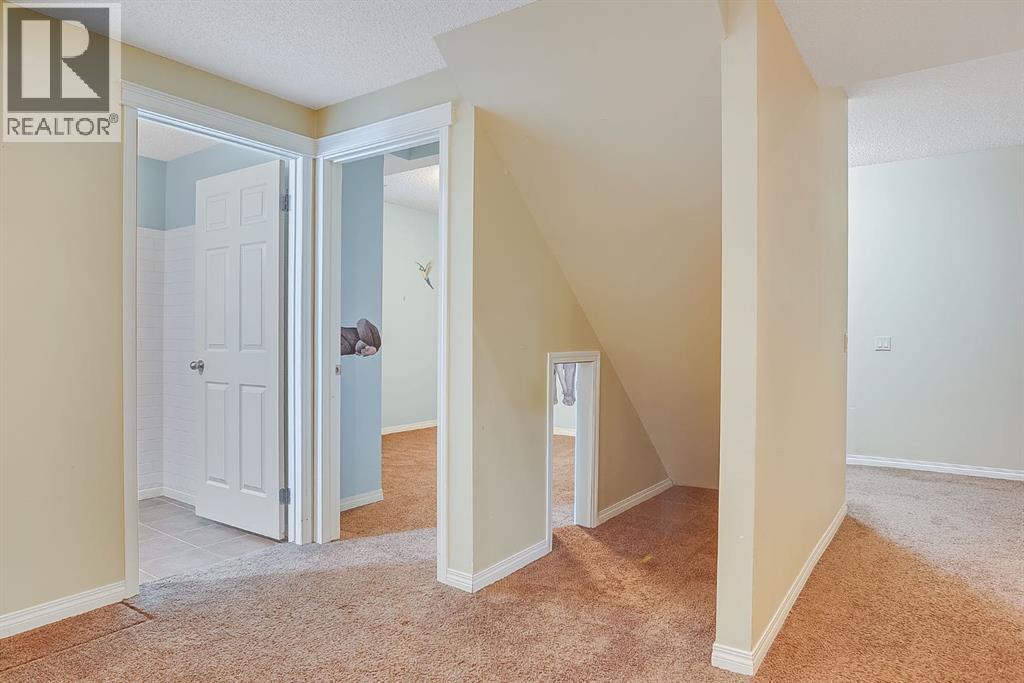 596 Cougar Ridge Drive Sw, Calgary, Alberta  T3H 5A4 - Photo 38 - A2216232