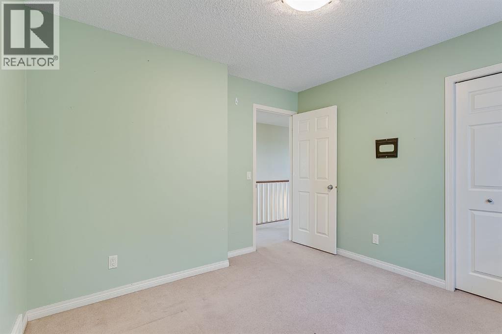 596 Cougar Ridge Drive Sw, Calgary, Alberta  T3H 5A4 - Photo 28 - A2216232