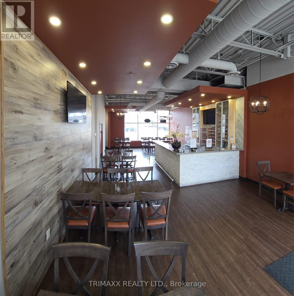 E 104 - 4195 King Street, Kitchener, Ontario  N2P 0C1 - Photo 2 - X12432799