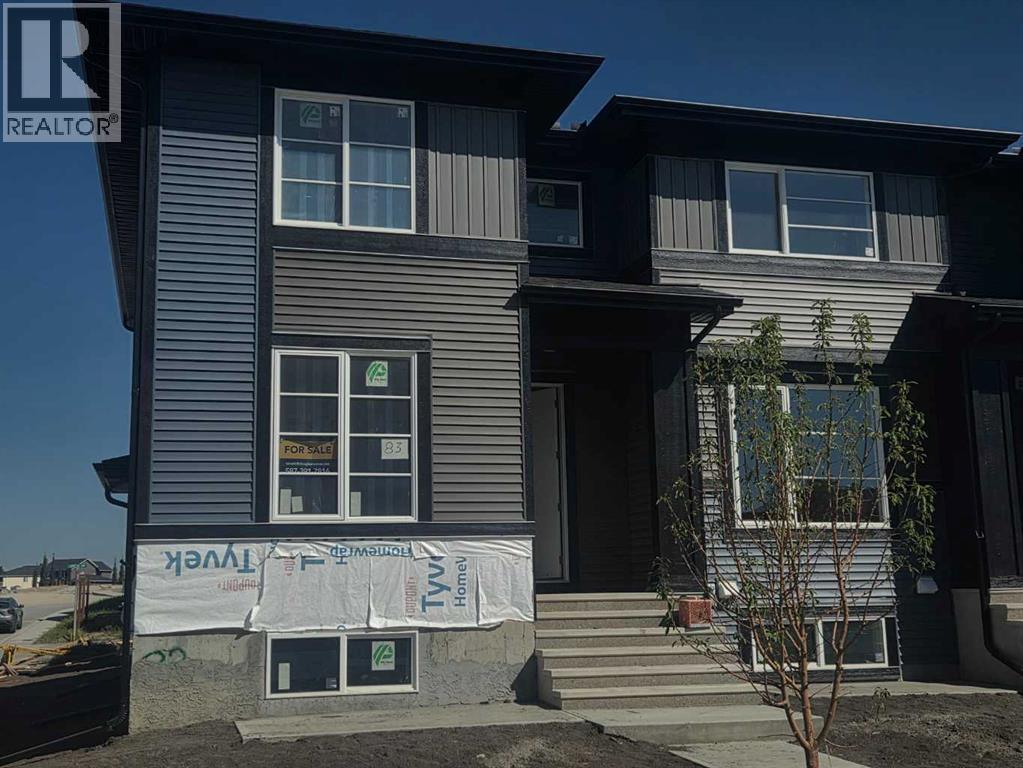 83 Lambeau Lane Se, Airdrie, Alberta  T4A 3P3 - Photo 1 - A2252044