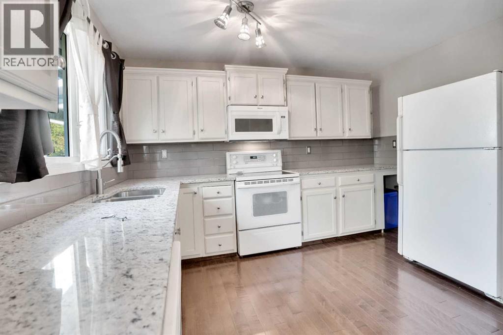 4764 Rundlewood Drive Ne, Calgary, Alberta  T1Y 2P1 - Photo 6 - A2260794