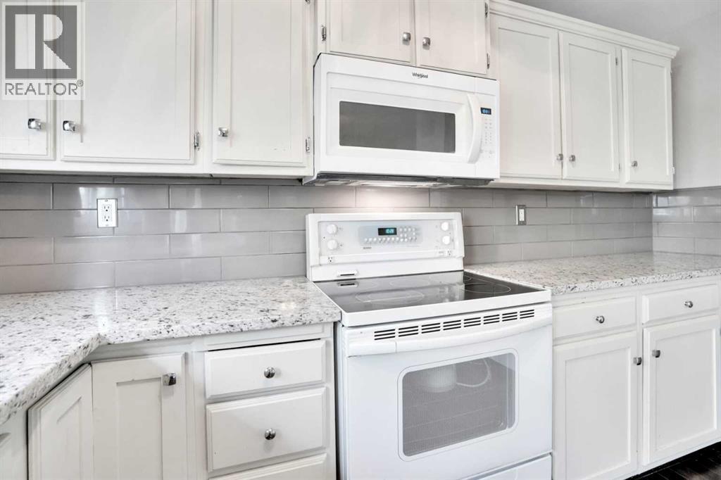 4764 Rundlewood Drive Ne, Calgary, Alberta  T1Y 2P1 - Photo 9 - A2260794