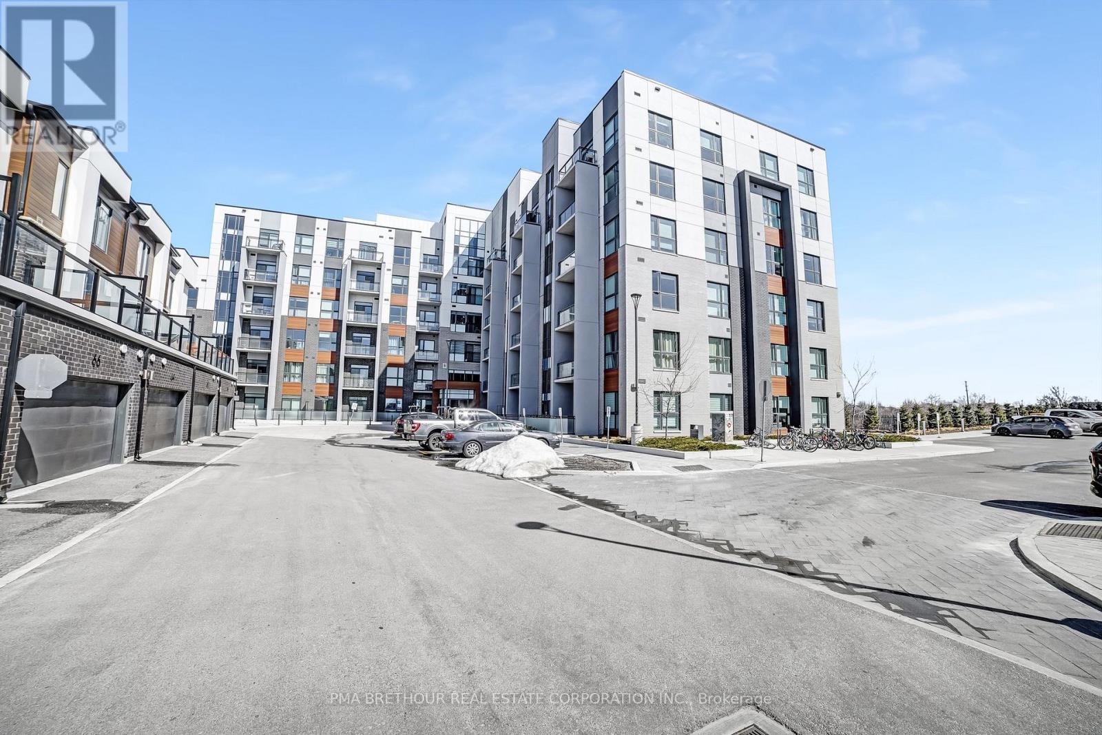 101 - 50 Kaitting Trail, Oakville, Ontario  L6M 5N3 - Photo 3 - W12432942