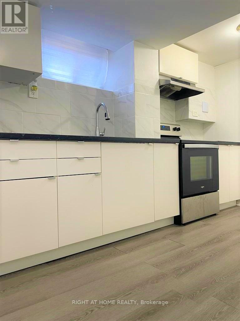 Bsmt - 18 Inverdon Road, Toronto, Ontario  M9C 4L5 - Photo 2 - W12433008