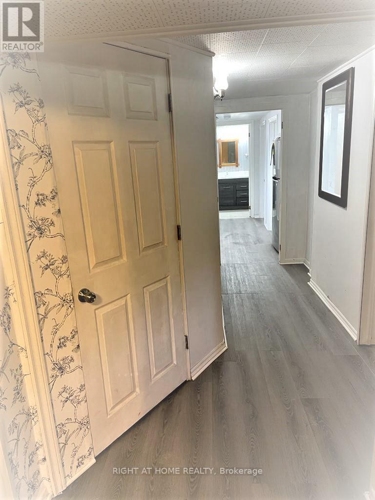 Bsmt - 18 Inverdon Road, Toronto, Ontario  M9C 4L5 - Photo 9 - W12433008