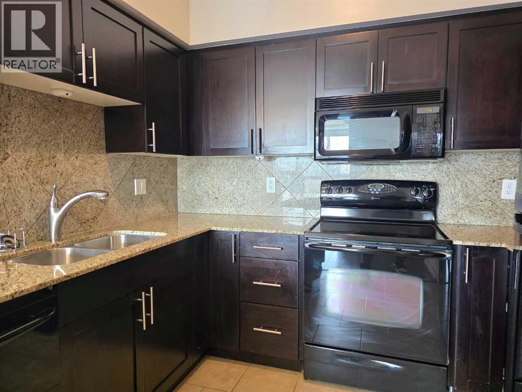 2008, 8710 Horton Road Sw, Calgary, Alberta  T2G 0P7 - Photo 7 - A2257917