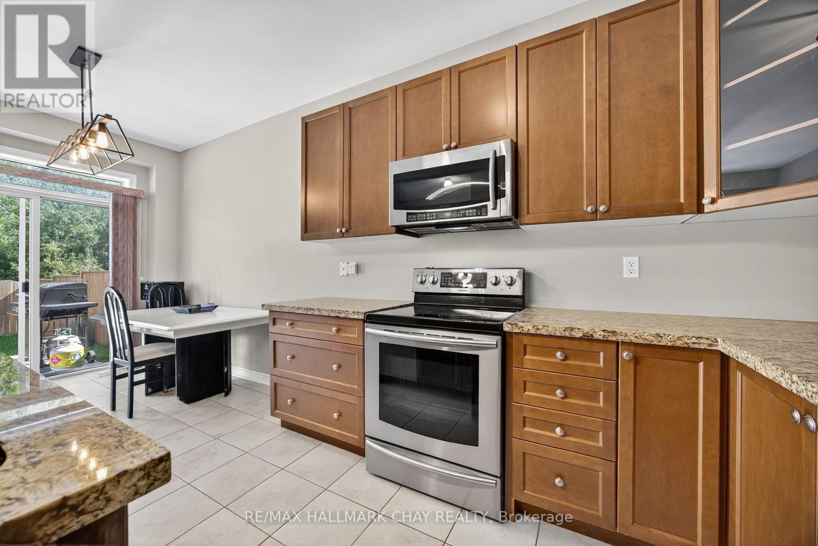 115 Collier Crescent, Essa, Ontario  L0M 1B5 - Photo 9 - N12433252