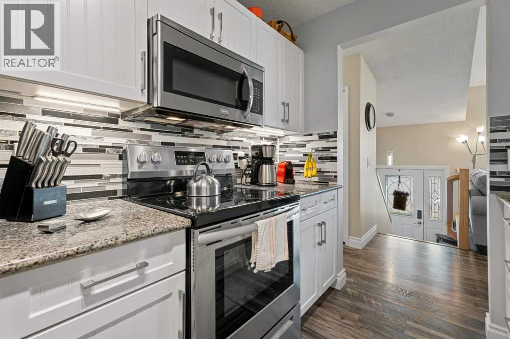 1205 Meadowbrook Drive Se, Airdrie, Alberta  T4A 1W6 - Photo 6 - A2256876