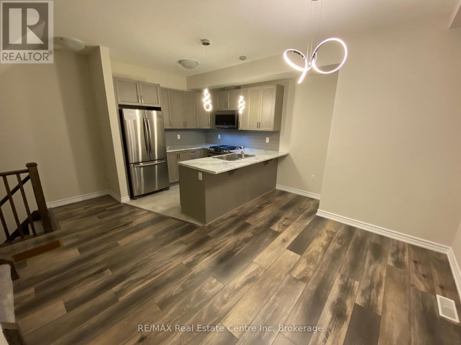 108 - 445 Ontario Street S, Milton, Ontario  L9T 9K4 - Photo 3 - W12433473
