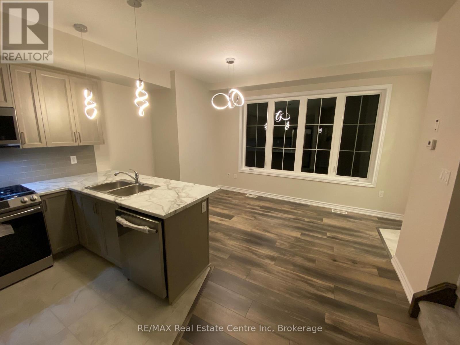 108 - 445 Ontario Street S, Milton, Ontario  L9T 9K4 - Photo 4 - W12433473
