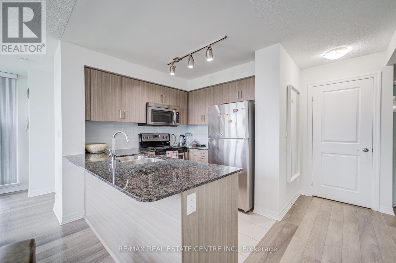 719 - 80 Esther Lorrie Drive, Toronto, Ontario  M9W 0C6 - Photo 5 - W12357035