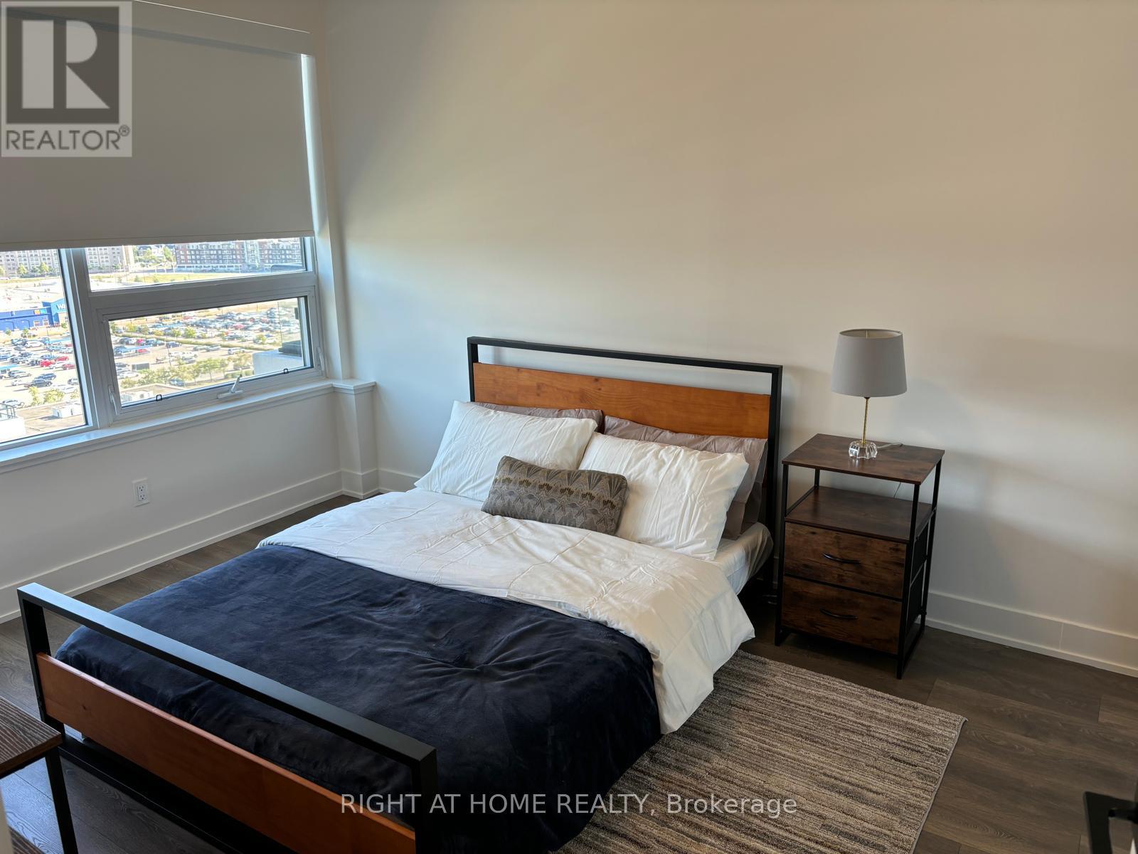 1312 - 2489 Taunton Road, Oakville, Ontario  L6H 3R9 - Photo 2 - W12433551