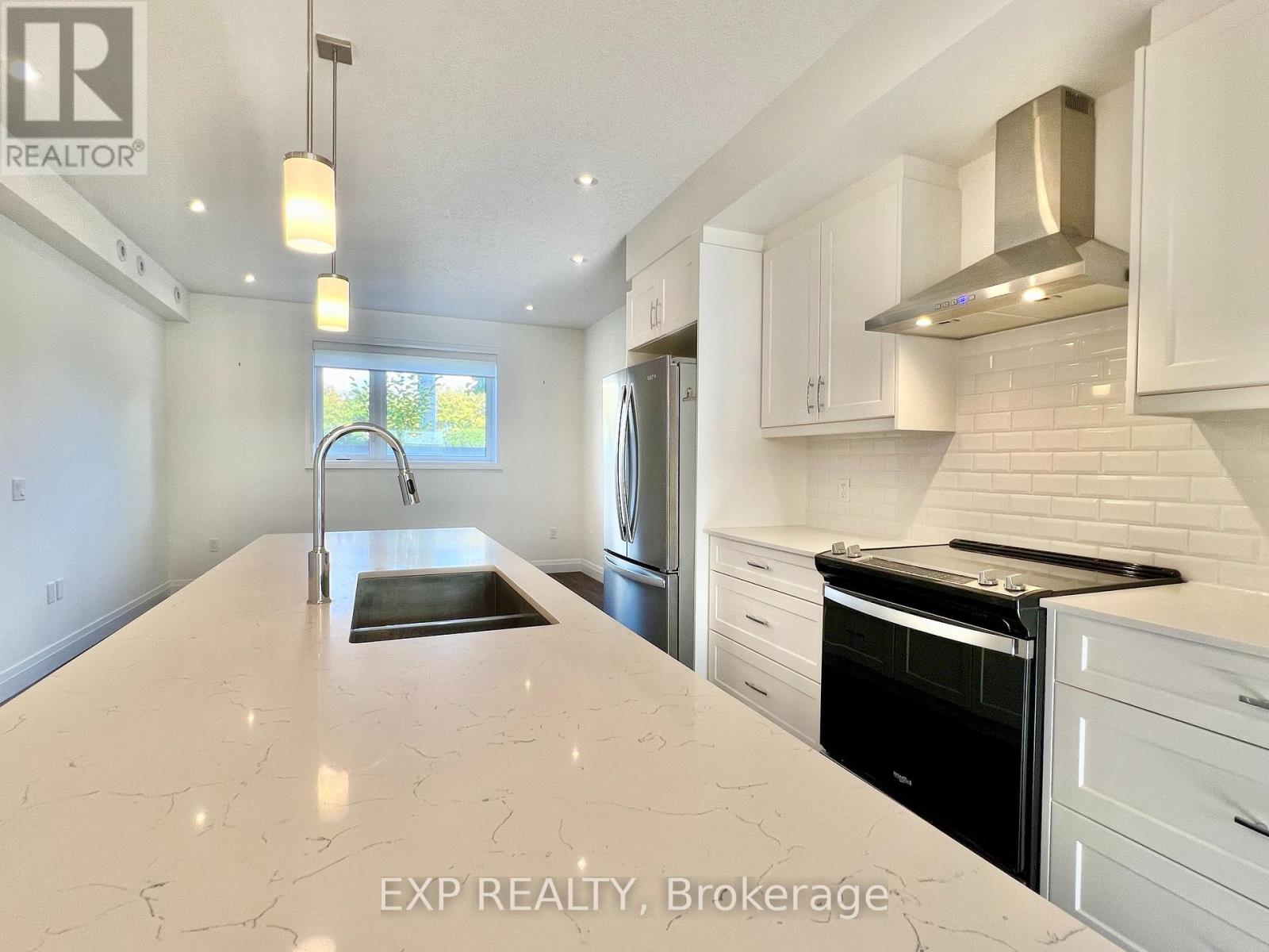 16 Duggan Lane N, Guelph, Ontario  N1L 0R2 - Photo 4 - X12433531