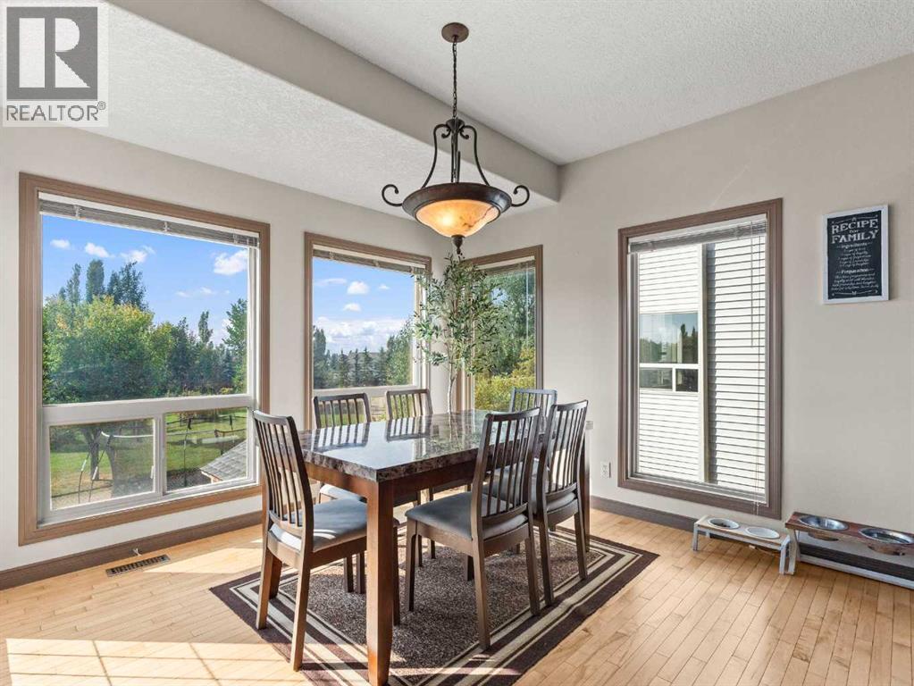 95 Crystal Shores Road, Okotoks, Alberta  T1S 2H9 - Photo 9 - A2244699