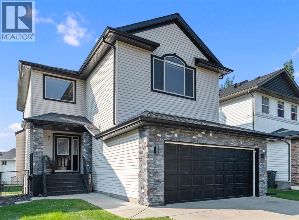 95 Crystal Shores Road, Okotoks, Alberta  T1S 2H9 - Photo 1 - A2244699
