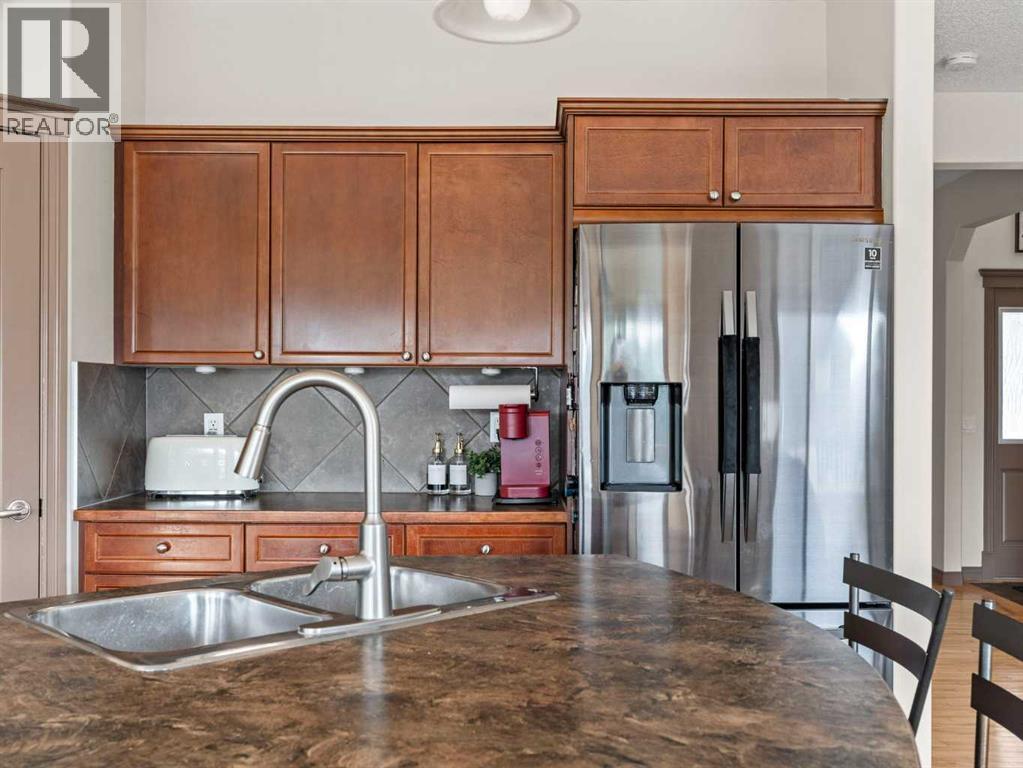 95 Crystal Shores Road, Okotoks, Alberta  T1S 2H9 - Photo 14 - A2244699