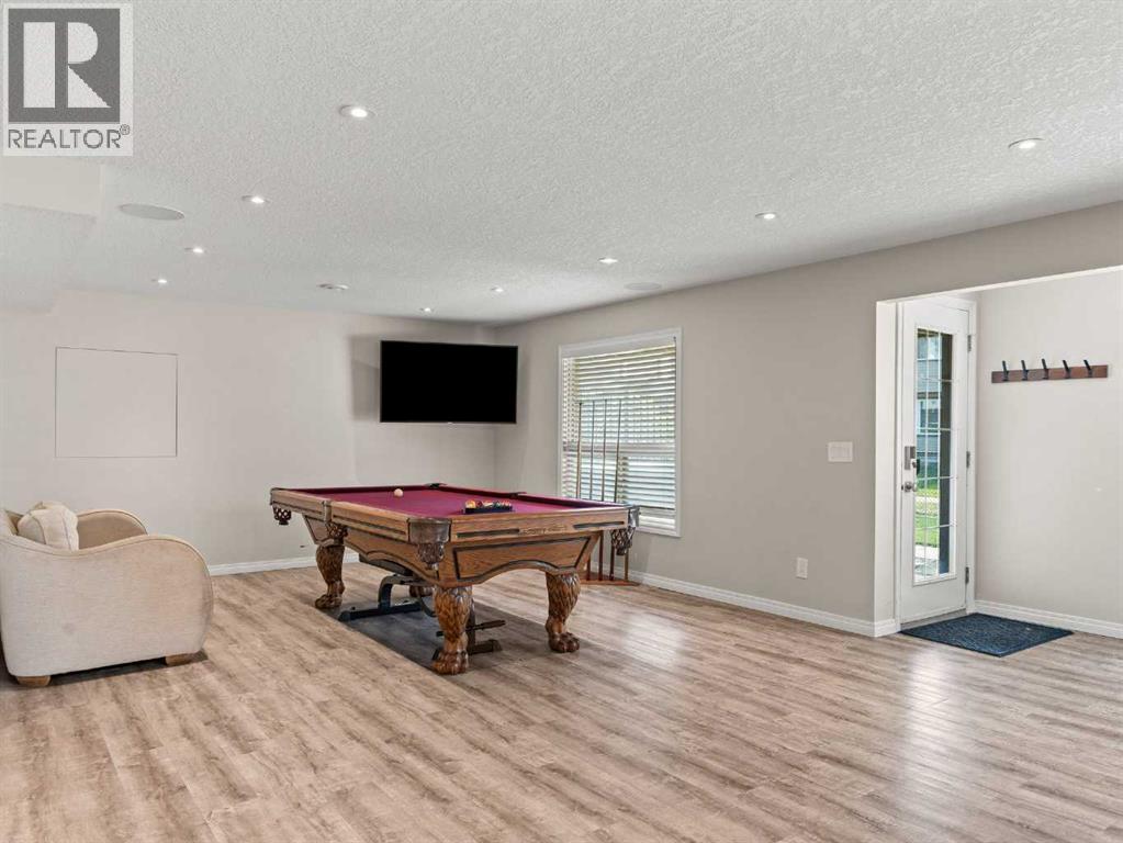 95 Crystal Shores Road, Okotoks, Alberta  T1S 2H9 - Photo 34 - A2244699