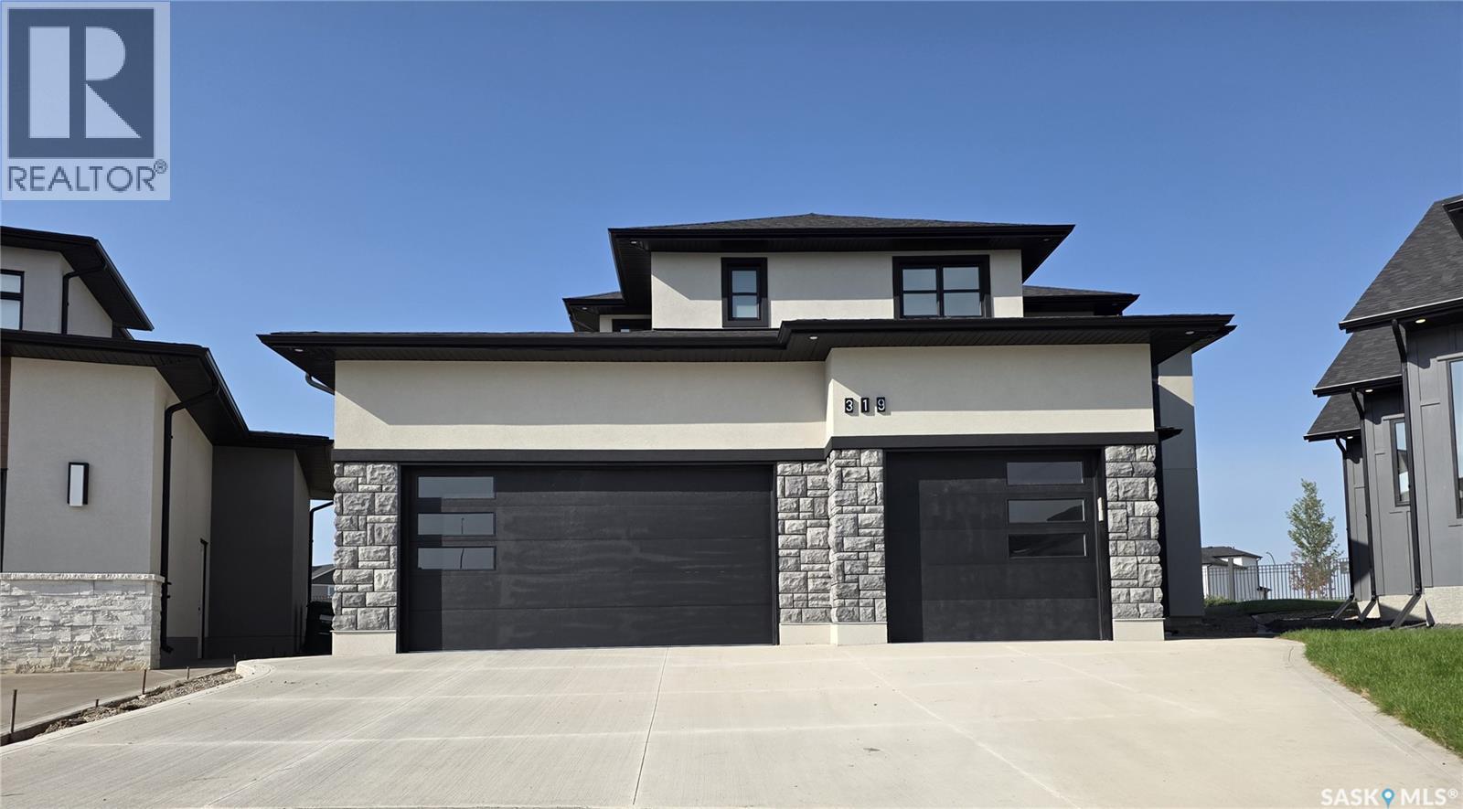 319 Woolf Bay, Saskatoon, Saskatchewan  S7W 1E5 - Photo 2 - SK019650