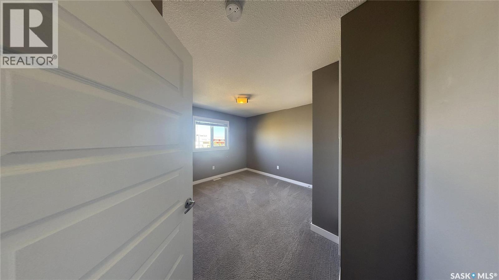411 Flynn Lane, Saskatoon, Saskatchewan  S7V 0L1 - Photo 19 - SK019313
