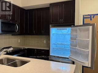 405 - 38 Annie Craig Drive, Toronto, Ontario  M8V 0G9 - Photo 9 - W12433647