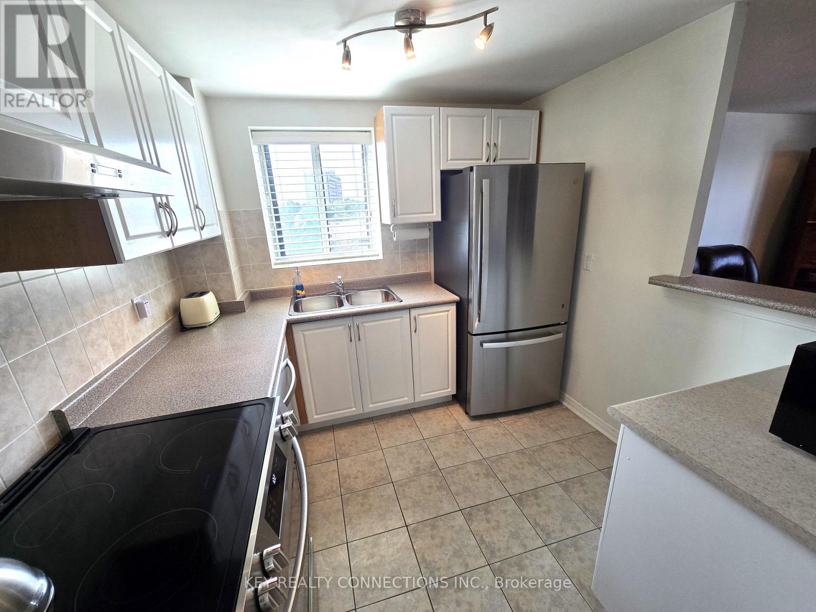 313 - 6720 Glen Erin Drive, Mississauga, Ontario  L5N 3K8 - Photo 6 - W12433663