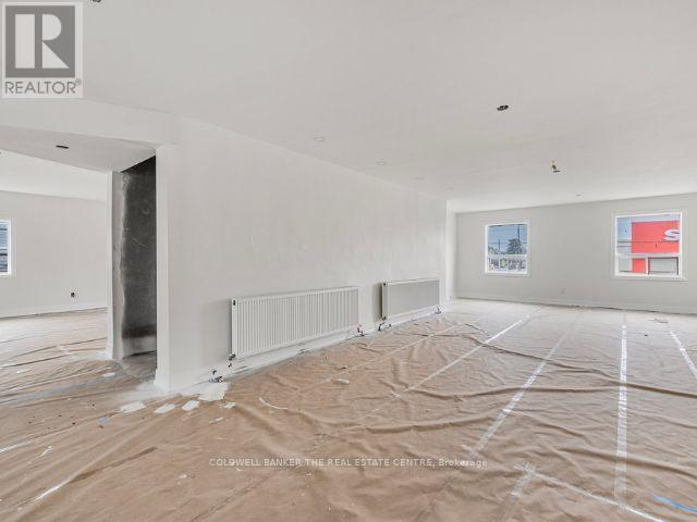 2a - 2242 Eglinton Avenue, Toronto, Ontario  M6E 2L3 - Photo 3 - W12433730