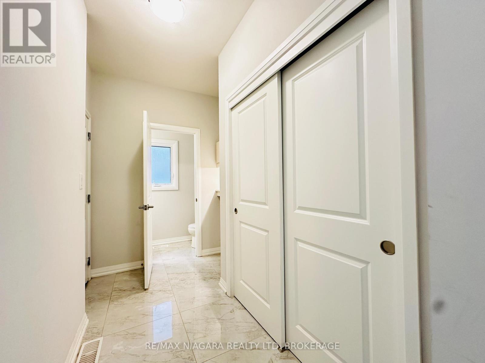 72 Bur Oak Drive, Thorold (Confederation Heights), Ontario  L2V 4Y6 - Photo 6 - X12433949