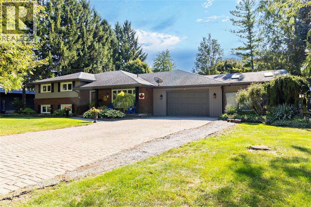 Have you been waiting for Country in the City, well wait no longer, Welcome to 22 Joplyn Road on the Edge of Chatham in the Prestigious Lynnwood subdivision, This 3 plus 1 bedroom 3 bath home on a beautiful .48 of an acre lot is perfect for the growing family. Boasting numerous updates over the last ten years this open concept home leaves nothing for you to do but move in! The main floor offers a Custom Kitchen, formal living and dining rooms, main floor laundry and an amazing Family Room Sunroom with Gas fireplace overlooking the backyard. The second level has a huge Master bedroom and sitting area with 5 pc ensuite bath featuring a soaker tub and a walk thru closet with built ins. It also has 2 more bedrooms and a 4pc bath! The lower level features a 4th bedroom and additional finished rec room! A 2 car garage and heated solarium/workshop round out this little slice of heaven!! Call today before this beauty is gone!! (id:48254)