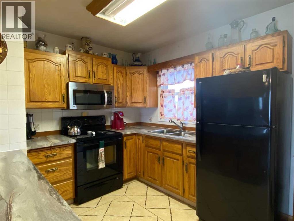 5207 49 Street, Ponoka, Alberta  T4J 1E1 - Photo 9 - A2229990