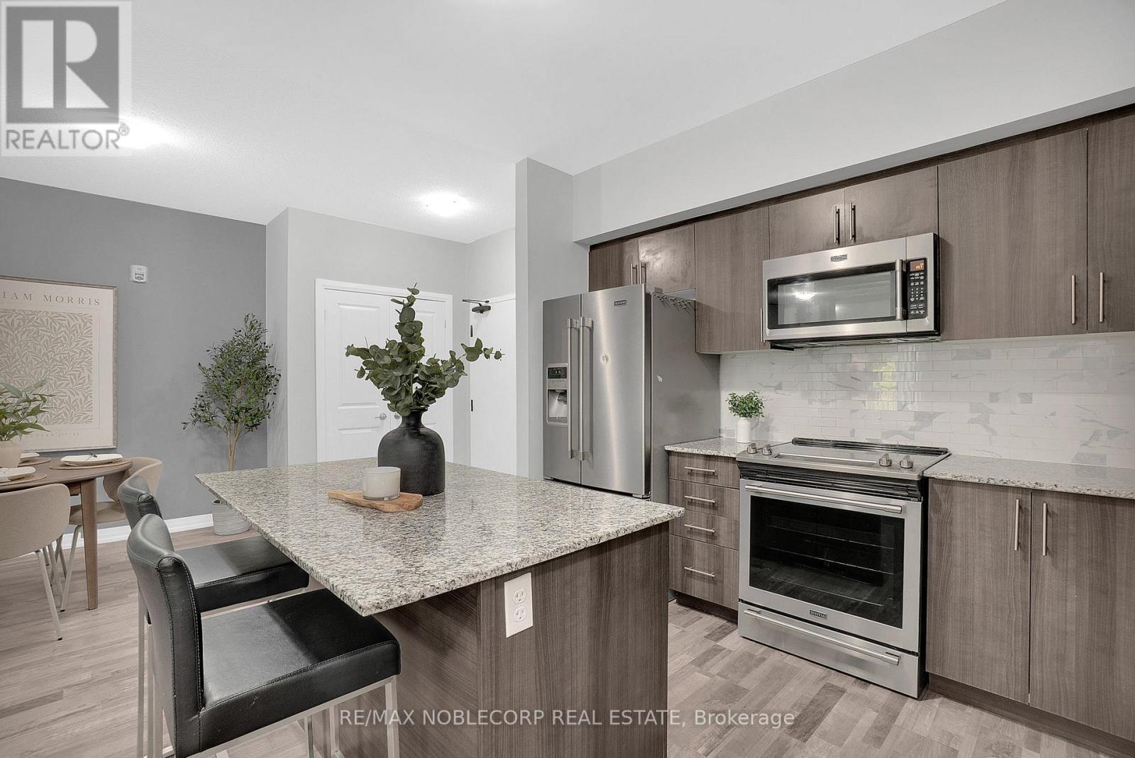206 - 157 Wellington Street E, New Tecumseth, Ontario  L9R 0R7 - Photo 11 - N12433908