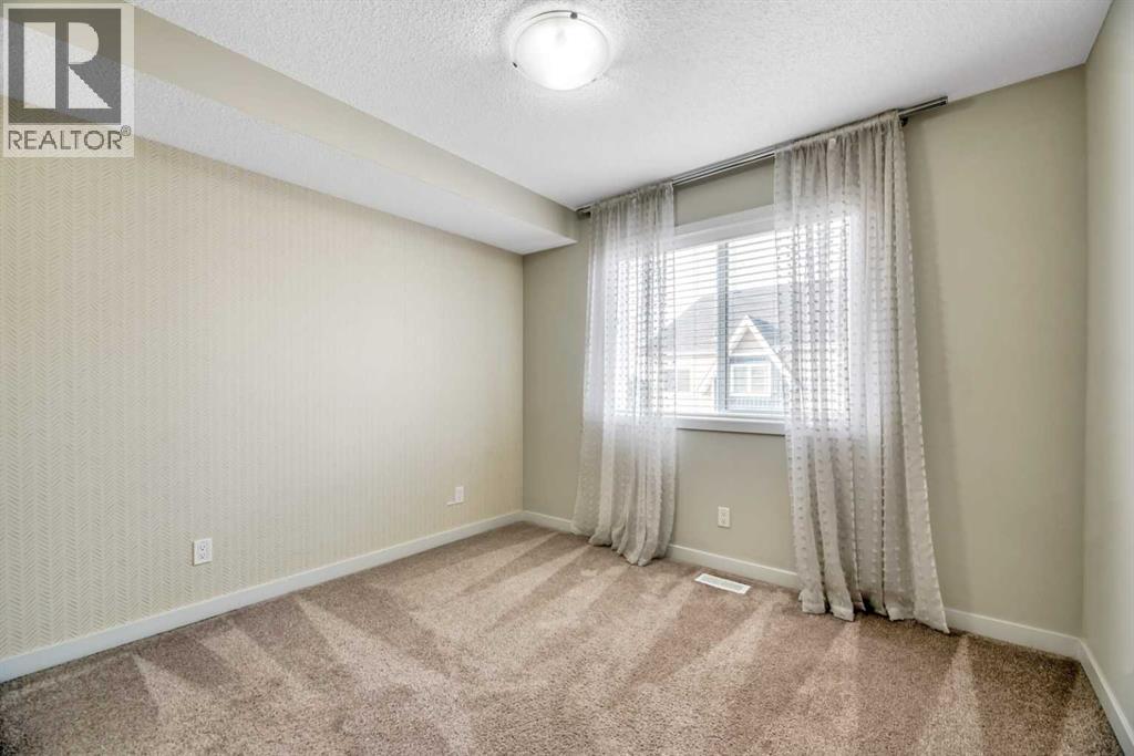104, 32 Red Embers Parade Ne, Calgary, Alberta  T3N 1P7 - Photo 31 - A2253796