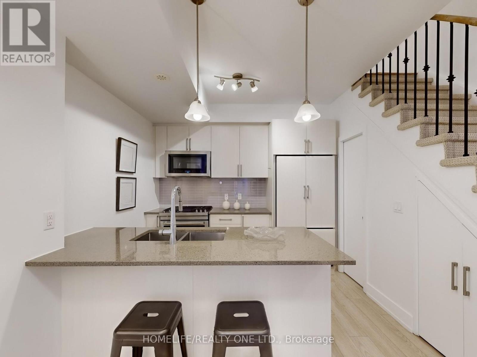 Th 41 - 3 Elsie Lane, Toronto, Ontario  M6P 0B8 - Photo 10 - W12434227