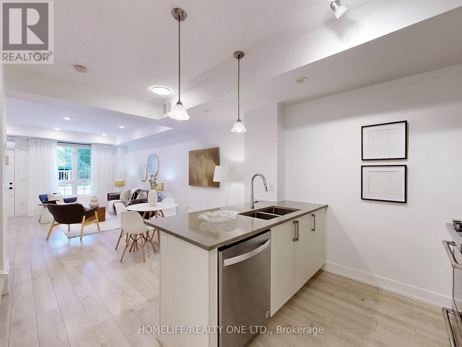Th 41 - 3 Elsie Lane, Toronto, Ontario  M6P 0B8 - Photo 13 - W12434227