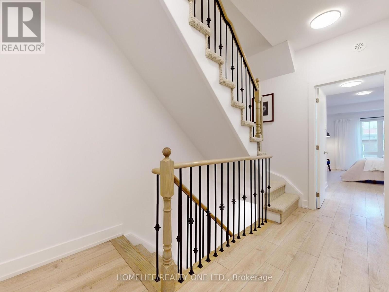 Th 41 - 3 Elsie Lane, Toronto, Ontario  M6P 0B8 - Photo 19 - W12434227