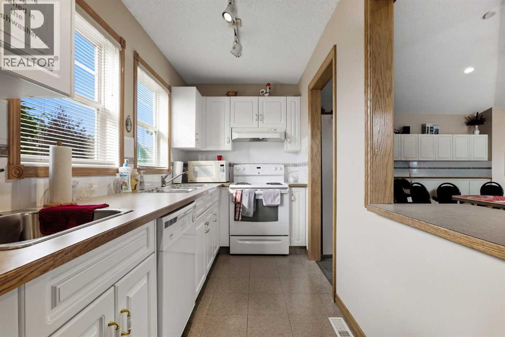 30, 1008 Woodside Way Nw, Airdrie, Alberta  T4B 2T7 - Photo 40 - A2256306