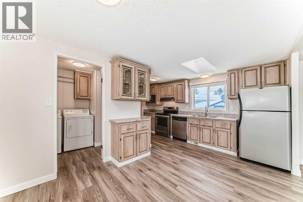 203 Burroughs Circle Ne, Calgary, Alberta  T1Y 6K8 - Photo 8 - A2252897