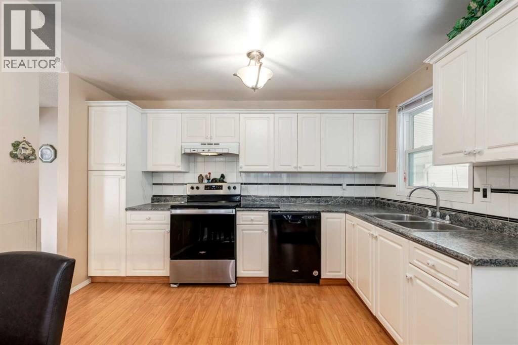 1812 Meadowbrook Drive Se, Airdrie, Alberta  T4A 1V4 - Photo 9 - A2256327