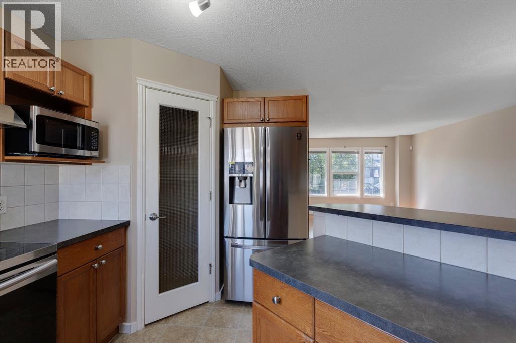 427 Saddlebrook Way Ne, Calgary, Alberta  T3J 5M7 - Photo 16 - A2248432