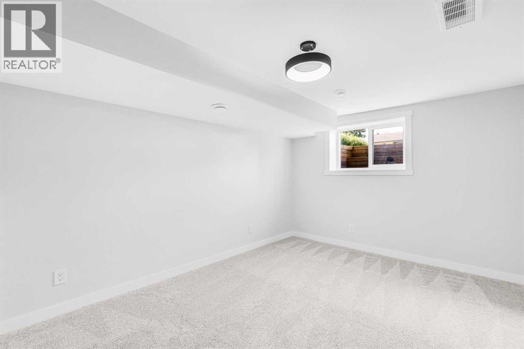 10604 Oakmoor Way Sw, Calgary, Alberta  T2W 2H8 - Photo 39 - A2238193