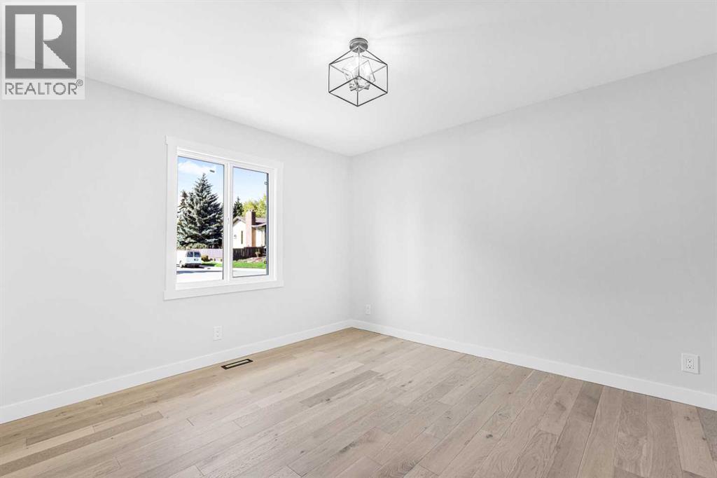 10604 Oakmoor Way Sw, Calgary, Alberta  T2W 2H8 - Photo 28 - A2238193