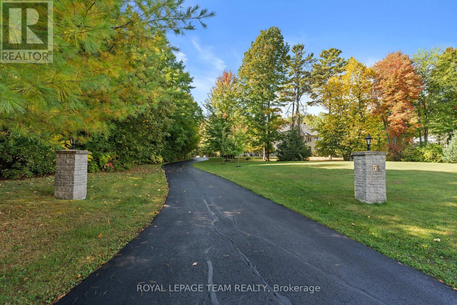 51 Marchvale Drive, Ottawa, Ontario  K2W 1C1 - Photo 4 - X12434552