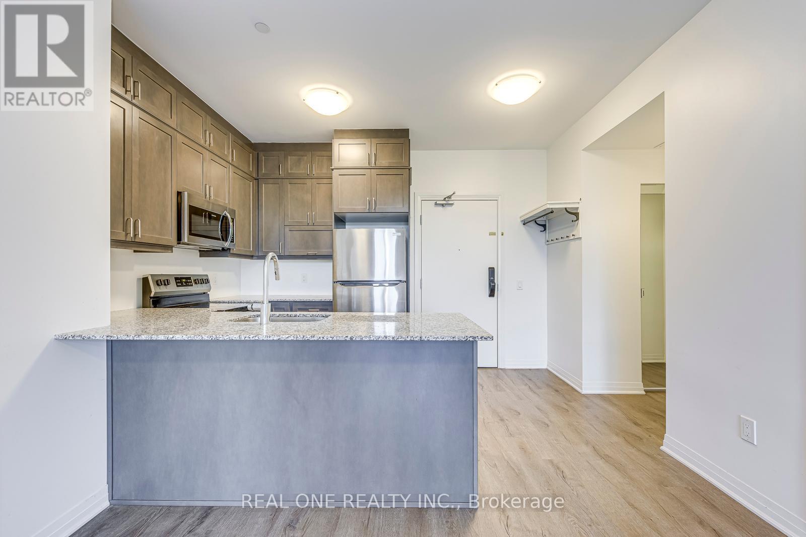 106 - 50 Kaitting Trail, Oakville, Ontario  L6M 5L3 - Photo 10 - W12434447