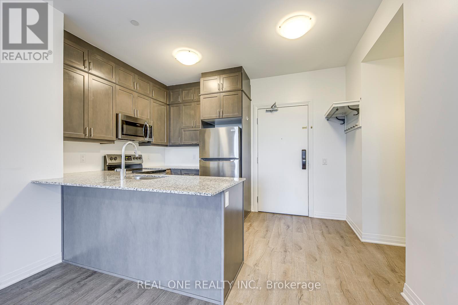 106 - 50 Kaitting Trail, Oakville, Ontario  L6M 5L3 - Photo 9 - W12434447