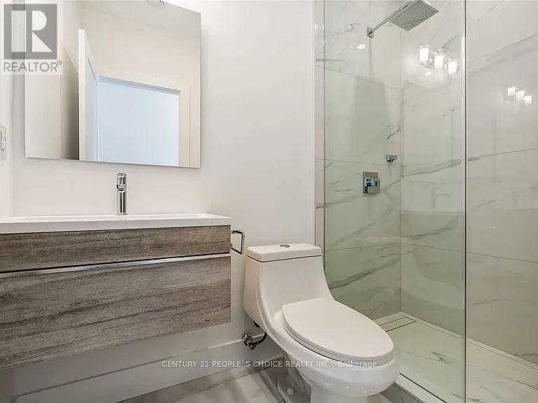 54 Westhampton Drive, Toronto, Ontario  M9R 1X6 - Photo 7 - W12430766