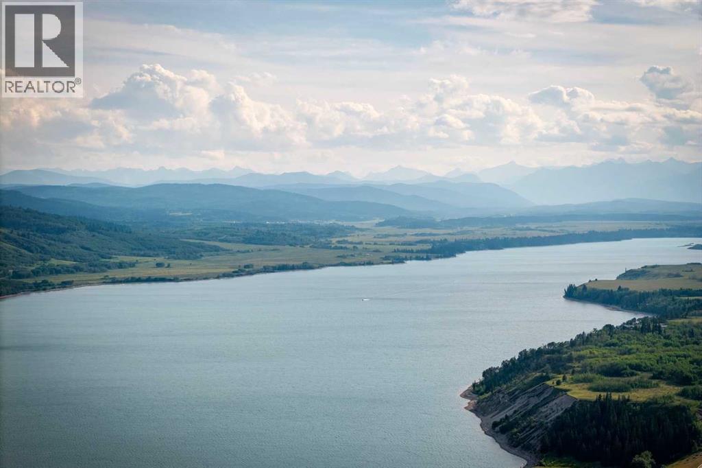 606 Cottageclub Bend, Rural Rocky View County, Alberta  T4C 1B1 - Photo 2 - A2261043