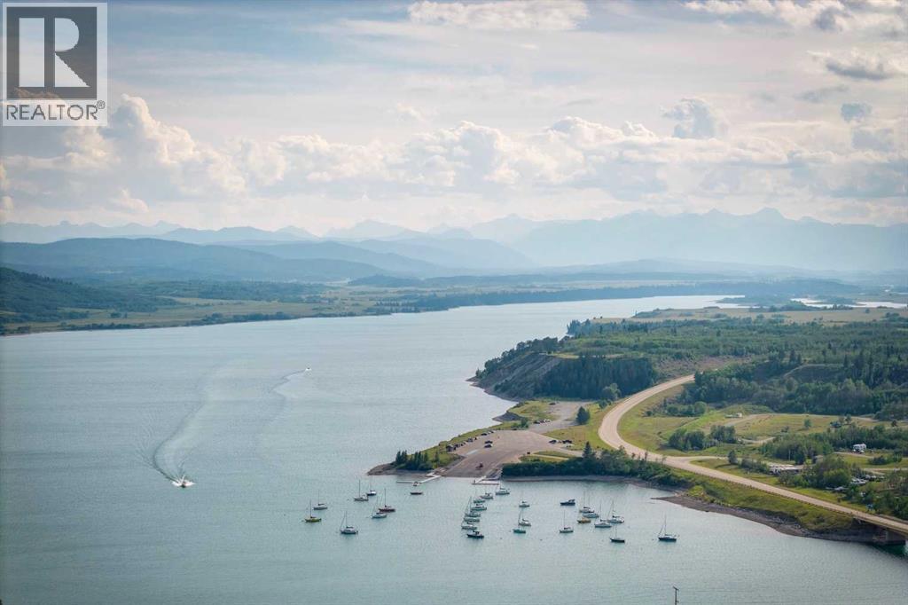 606 Cottageclub Bend, Rural Rocky View County, Alberta  T4C 1B1 - Photo 3 - A2261043